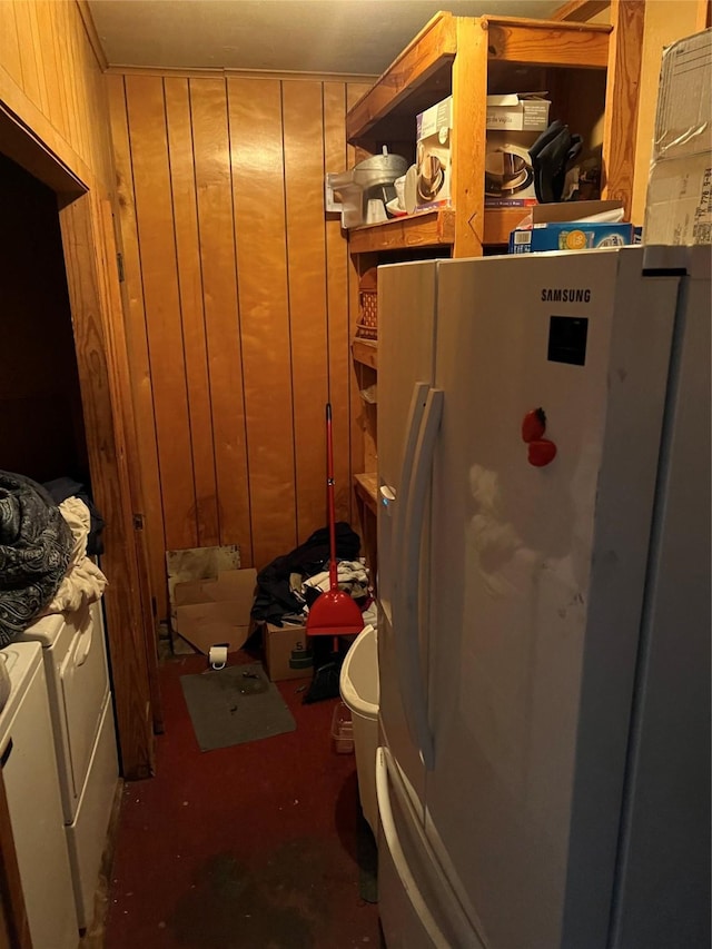 storage area with separate washer and dryer