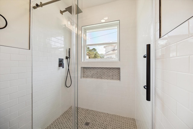 bathroom with a stall shower