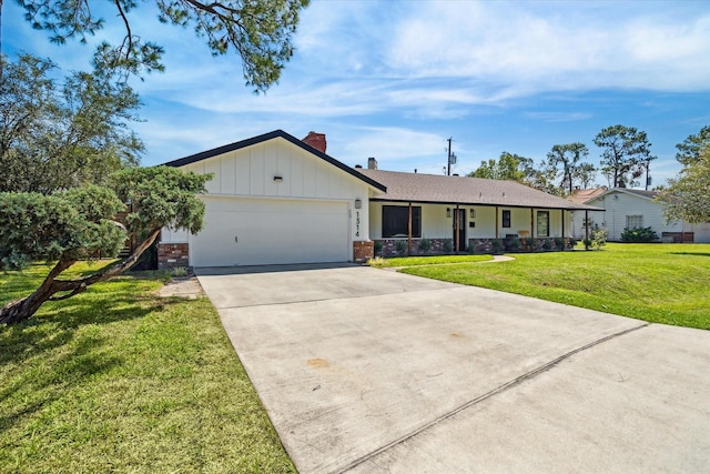 ranch-style house featuring driveway, brick siding, an attached garage, a porch, and a front yard