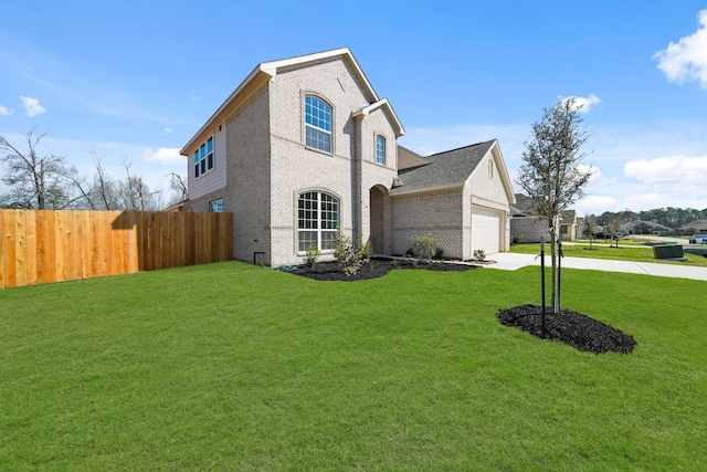 289 Galant Fox Way, New Caney, TX 77357 - view of front of property featuring fence, a front lawn, concrete driveway, and brick siding