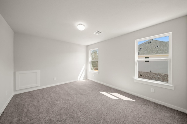 289 Galant Fox Way, New Caney, TX 77357 - carpeted empty room featuring visible vents and baseboards