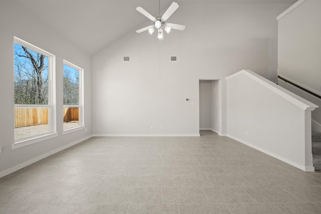 289 Galant Fox Way, New Caney, TX 77357 - unfurnished living room with visible vents, ceiling fan, stairway, and baseboards