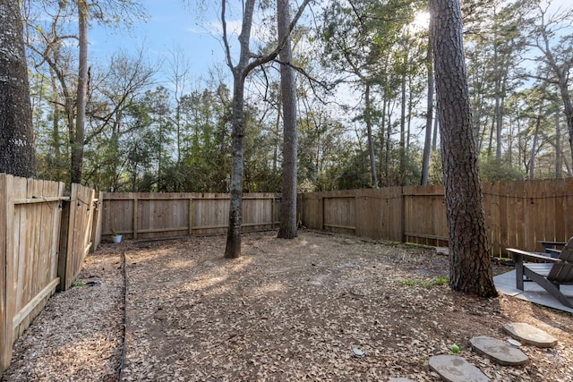 view of yard featuring a fenced backyard