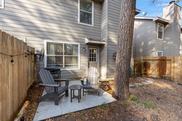 view of patio featuring a fenced backyard