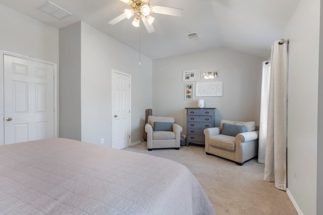 bedroom with lofted ceiling, ceiling fan, visible vents, and light colored carpet