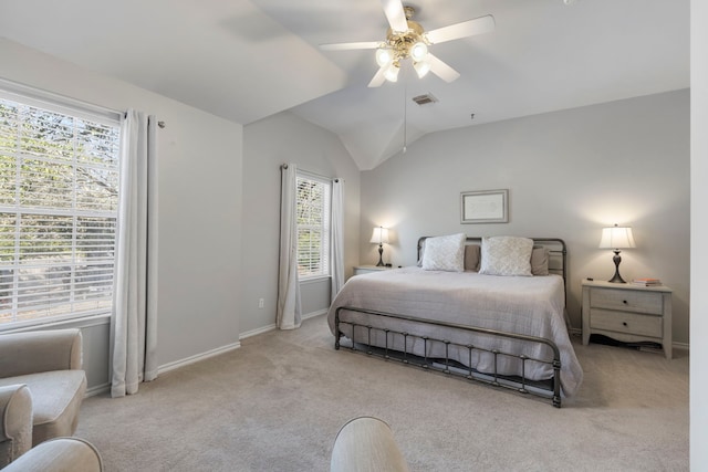 bedroom featuring carpet flooring, vaulted ceiling, visible vents, and baseboards