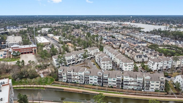 aerial view featuring a water view and a residential view