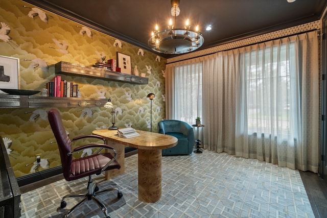 home office with crown molding and wallpapered walls