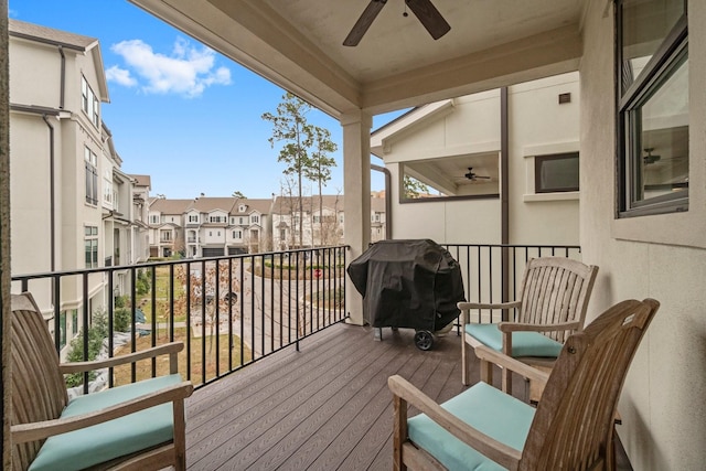 balcony featuring a residential view, a grill, and ceiling fan