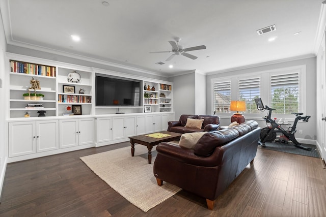 living room with ornamental molding, visible vents, dark wood finished floors, and a ceiling fan