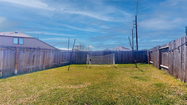 view of yard featuring a fenced backyard