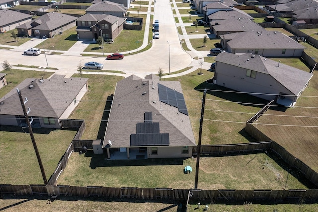 birds eye view of property with a residential view