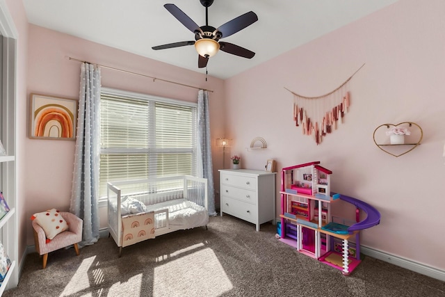 bedroom with carpet, baseboards, and a ceiling fan