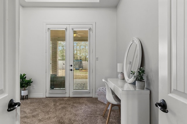 doorway with french doors and carpet flooring