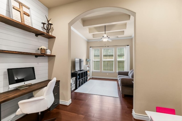 office area featuring arched walkways, dark wood-type flooring, ceiling fan, beamed ceiling, and baseboards