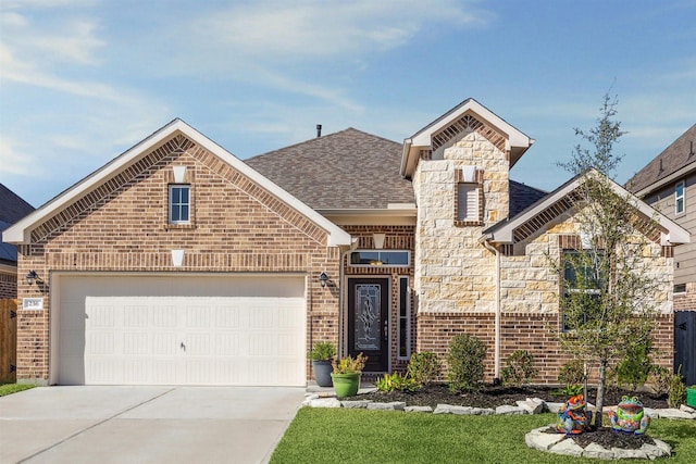 french country home featuring brick siding, a shingled roof, concrete driveway, a garage, and stone siding