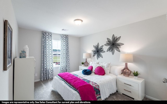 carpeted bedroom featuring visible vents and baseboards