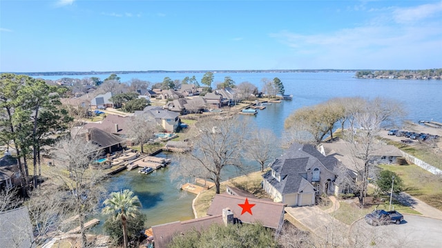 aerial view with a water view and a residential view