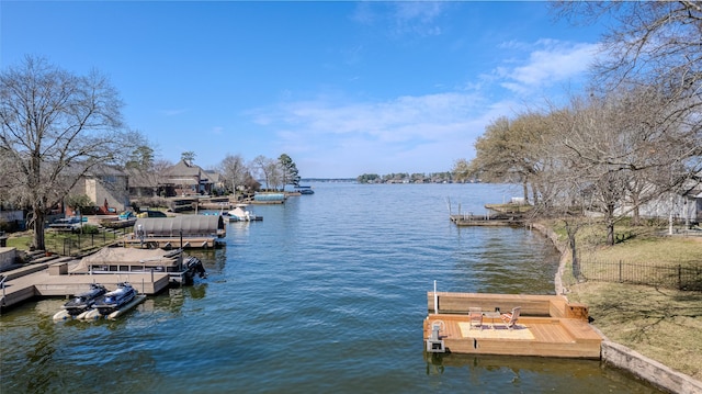 dock area with a water view