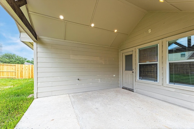 view of patio / terrace featuring fence