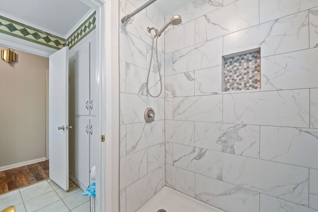 bathroom featuring a tile shower