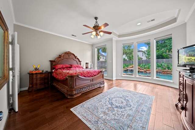 bedroom with visible vents, wood-type flooring, ornamental molding, and access to outside