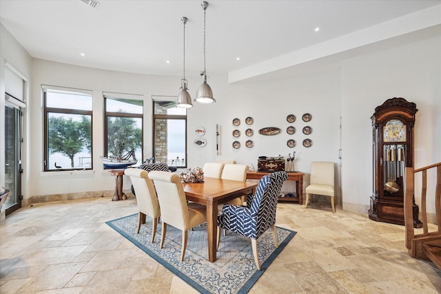 dining space featuring recessed lighting, stone tile flooring, stairway, and baseboards