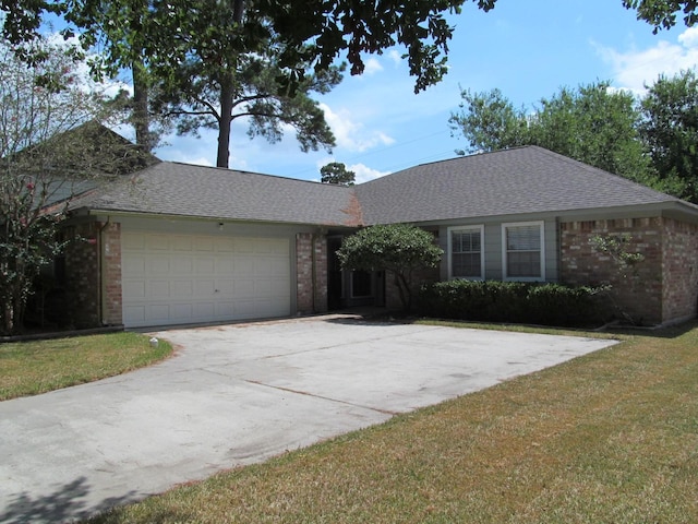 ranch-style house with a garage, driveway, brick siding, and a front lawn