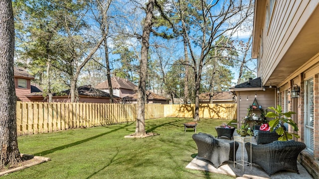 view of yard featuring a fenced backyard