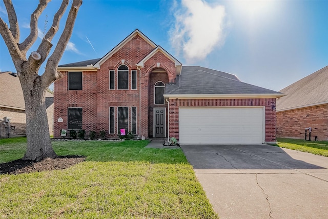 traditional-style home featuring a front lawn, an attached garage, brick siding, and driveway