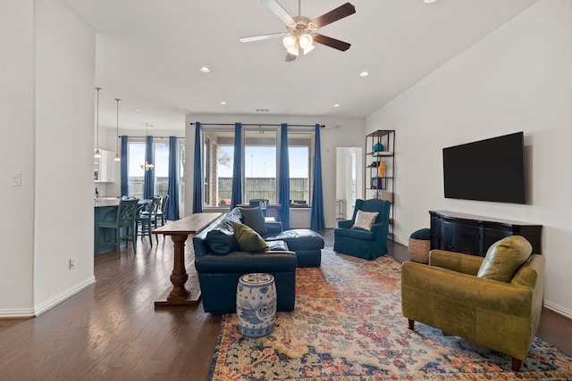 living room featuring baseboards, a ceiling fan, wood finished floors, and recessed lighting