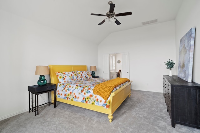 carpeted bedroom featuring lofted ceiling, visible vents, ceiling fan, and baseboards