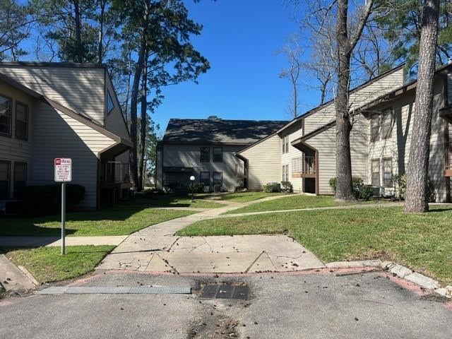 exterior space with a yard