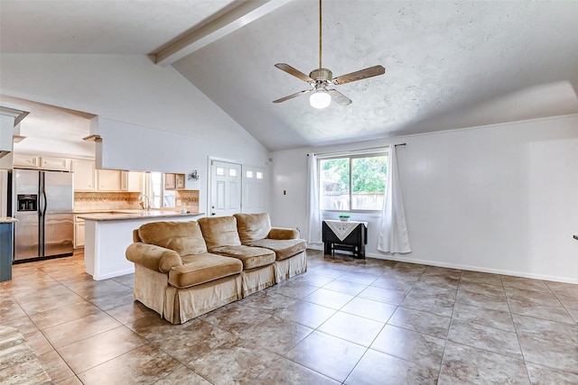 living area with high vaulted ceiling, light tile patterned flooring, beam ceiling, and a ceiling fan