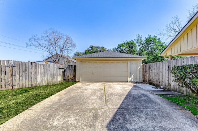 detached garage with fence