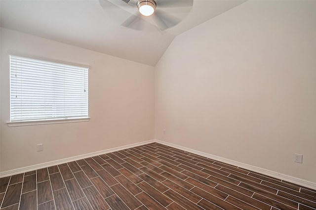 10714 Barker Lake Ct, Cypress, TX 77433 - spare room featuring lofted ceiling, ceiling fan, wood finish floors, and baseboards