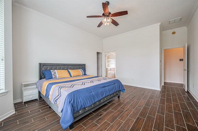 bedroom featuring baseboards, ornamental molding, visible vents, and wood tiled floor