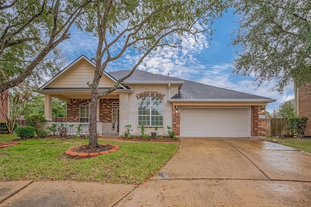 10714 Barker Lake Ct, Cypress, TX 77433 - view of front of home featuring a garage, driveway, brick siding, a shingled roof, and a porch