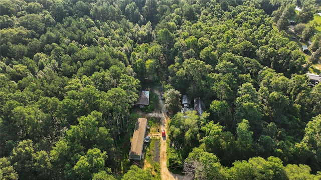 bird's eye view featuring a forest view