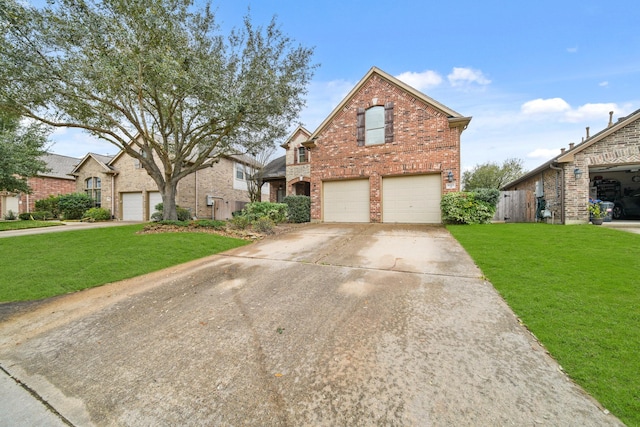 traditional home featuring an attached garage, brick siding, fence, driveway, and a front lawn