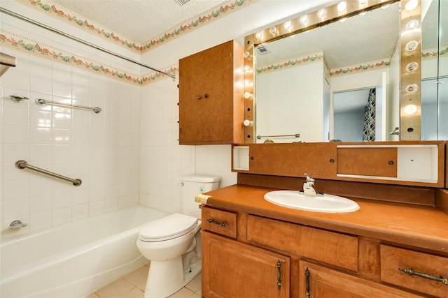 full bathroom with a textured ceiling, tile patterned flooring, toilet, vanity, and  shower combination