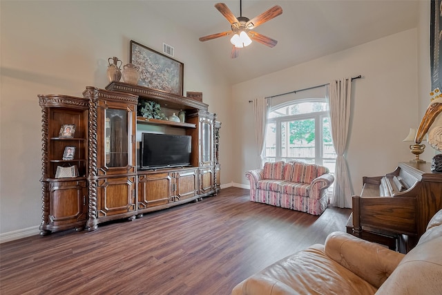 1234 Bergman Ct, Conroe, TX 77384 - living room with dark wood-style flooring, a ceiling fan, and high vaulted ceiling