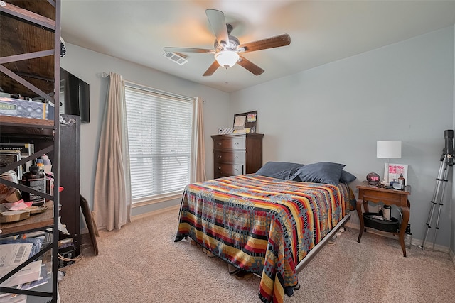 1234 Bergman Ct, Conroe, TX 77384 - carpeted bedroom with baseboards and ceiling fan