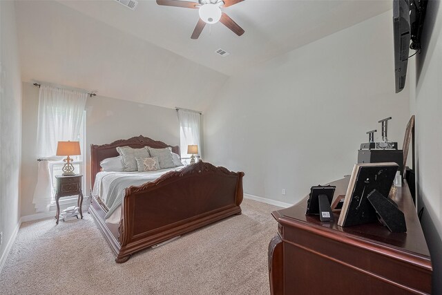1234 Bergman Ct, Conroe, TX 77384 - bedroom with light colored carpet, lofted ceiling, and ceiling fan