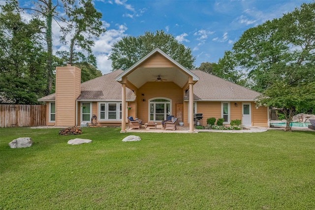 1234 Bergman Ct, Conroe, TX 77384 - rear view of property with a ceiling fan, a chimney, a shingled roof, and a patio area