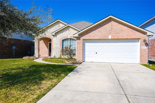 view of front of home featuring driveway, a garage, a front lawn, and brick siding