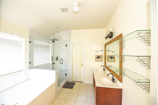 full bathroom featuring a marble finish shower, visible vents, a garden tub, tile patterned flooring, and a sink