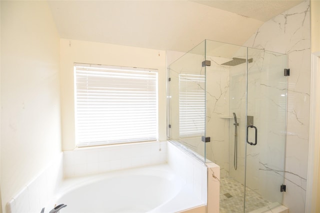 full bath featuring a textured ceiling, a marble finish shower, and a bath