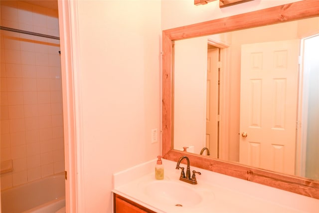 bathroom featuring vanity and shower / bathtub combination