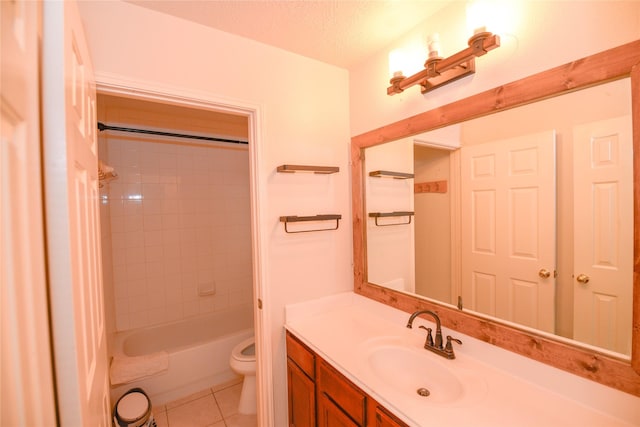 full bathroom with shower / bath combination, toilet, tile patterned floors, a textured ceiling, and vanity